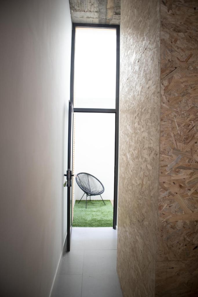 Apartamento encantador com pequeno pátio escondido