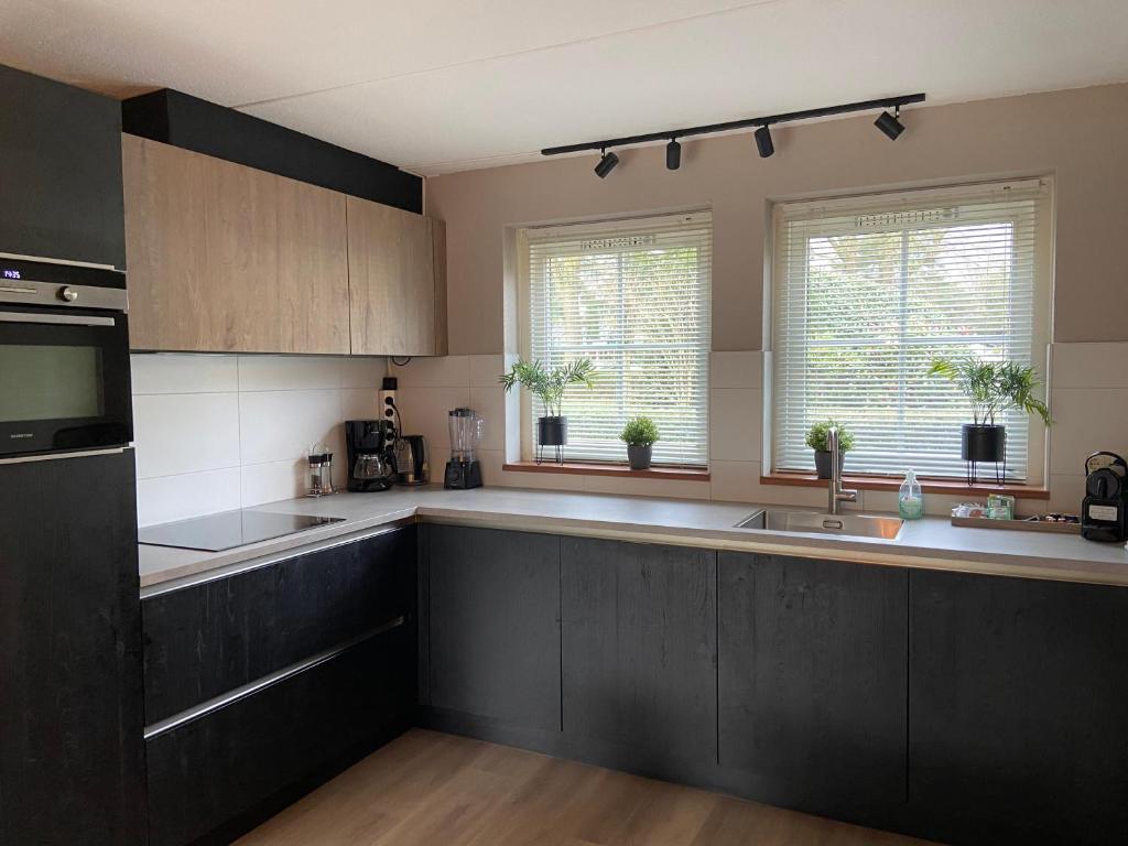 Bosboerderij de Veluwe, luxe huisje in het bos photo 2