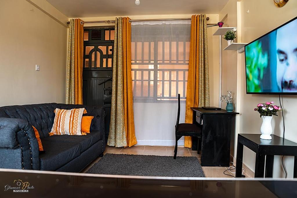 STYLISH 1BR APARTMENT IN KISUMU: FAST WI-FI, NETFLIX, SECURE PARKING photo 1