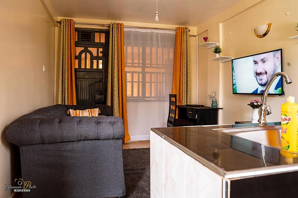STYLISH 1BR APARTMENT IN KISUMU: FAST WI-FI, NETFLIX, SECURE PARKING photo 2
