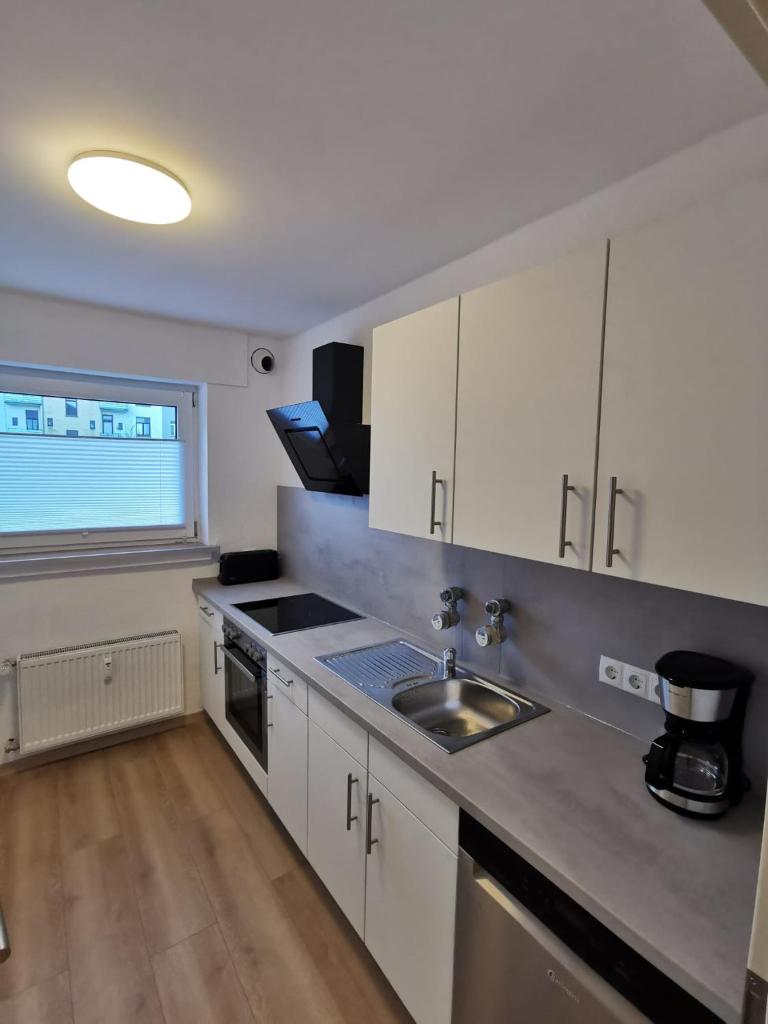 Frisch sanierte Ferienwohnung 2 min vom Südstrand - Balkon - PAY TV photo 4
