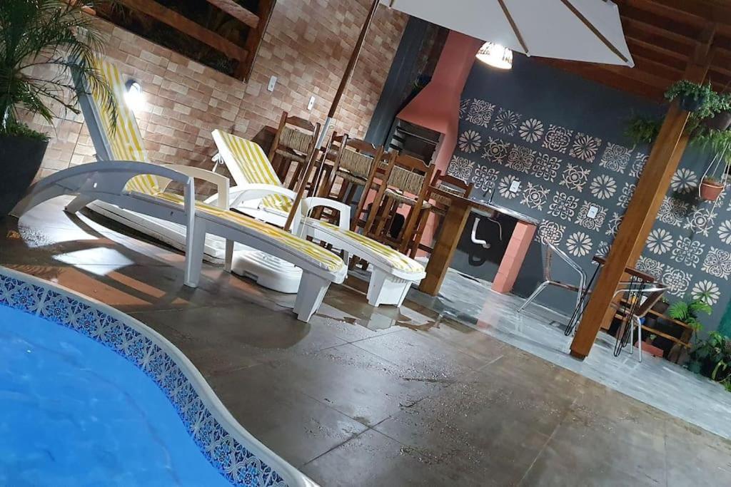 Casa na Praia do Sonho com Piscina e Jardim. photo 2