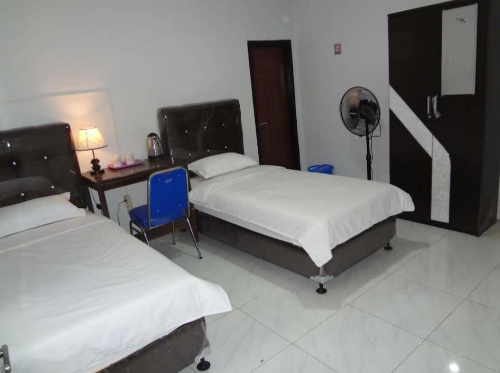 Asmanida Syariah Guest House Room Type - Twin Room with Private Bathroom
