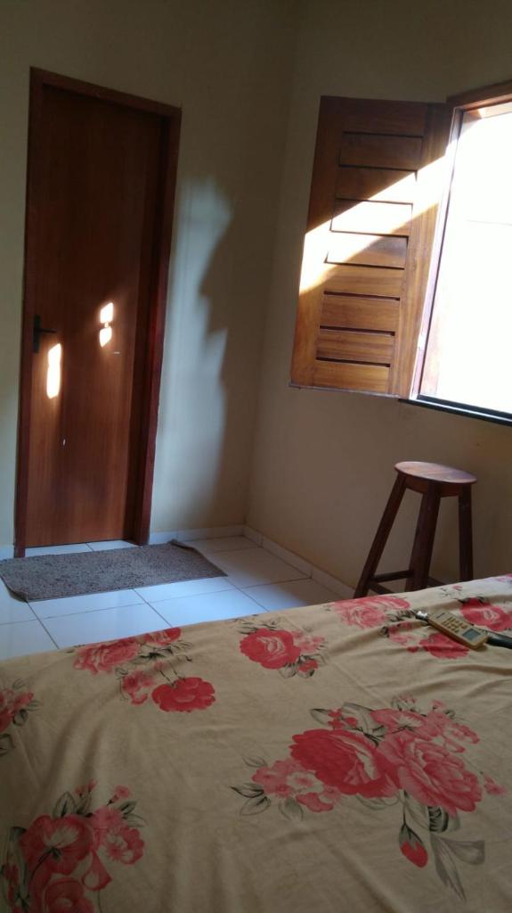 Linda casa com Ar, 3 quartos e garagem. photo 4