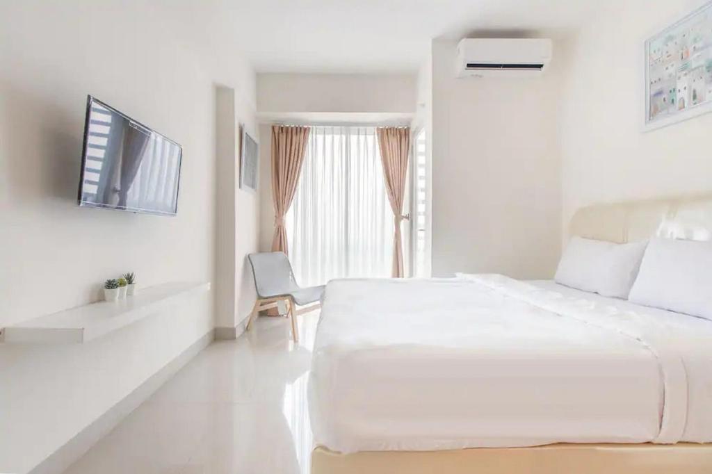 RedLiving Apartemen Grand Kamala Lagoon - Kita Pro Tower Barclay North photo 2