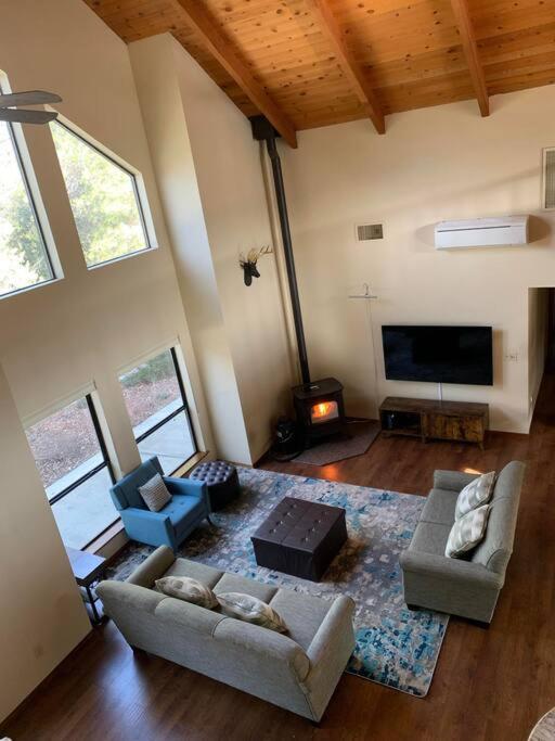 Yosemite Riverside retreat- an A-frame mountain home with a private beach and river access photo 2