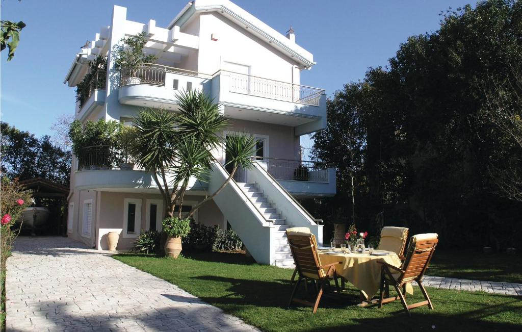 Stunning Home In Kamares Aigio Pel, With 4 Bedrooms And Wifi