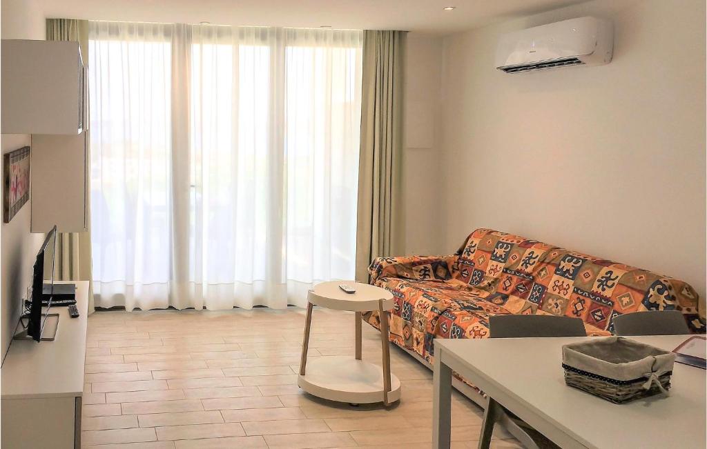 Stunning Apartment In Cannigione With 1 Bedrooms, Wifi And Outdoor Swimming Pool photo 4