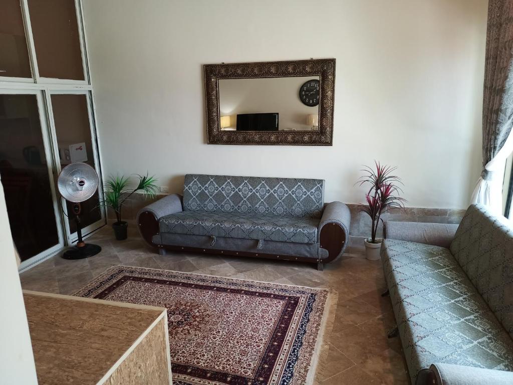 Bhurban 2bed townhouse with a lawn photo 2