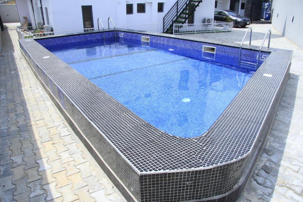 Cosy 2-Bedroom Apartment With Superfast Wifi and 24x7 Security and Electricity photo 1