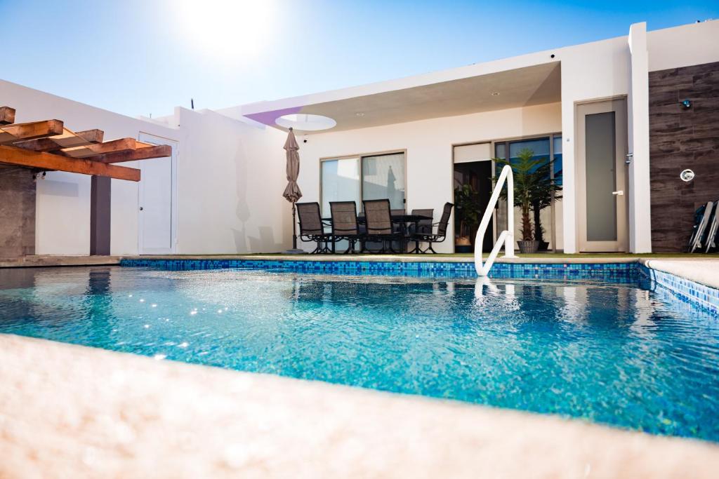 Brand new home with heated pool photo 2