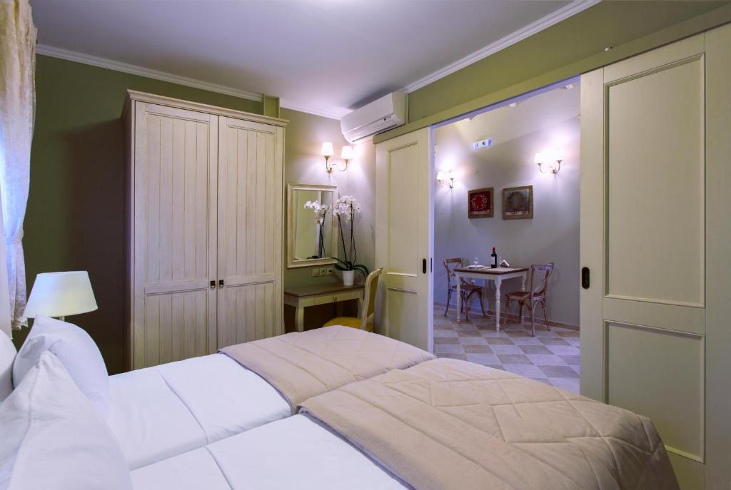 Ionia Suites - Tap to explore photos