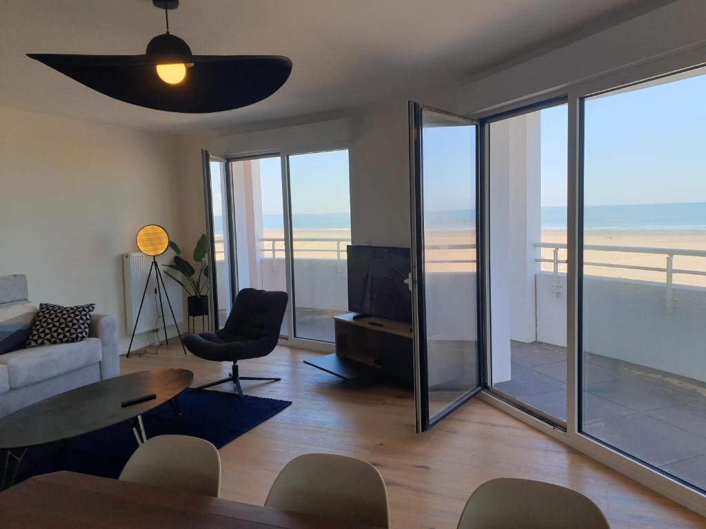 L'opaline - Vue plage-mer-digue-Wifi-Netflix-Parking abrité photo 2