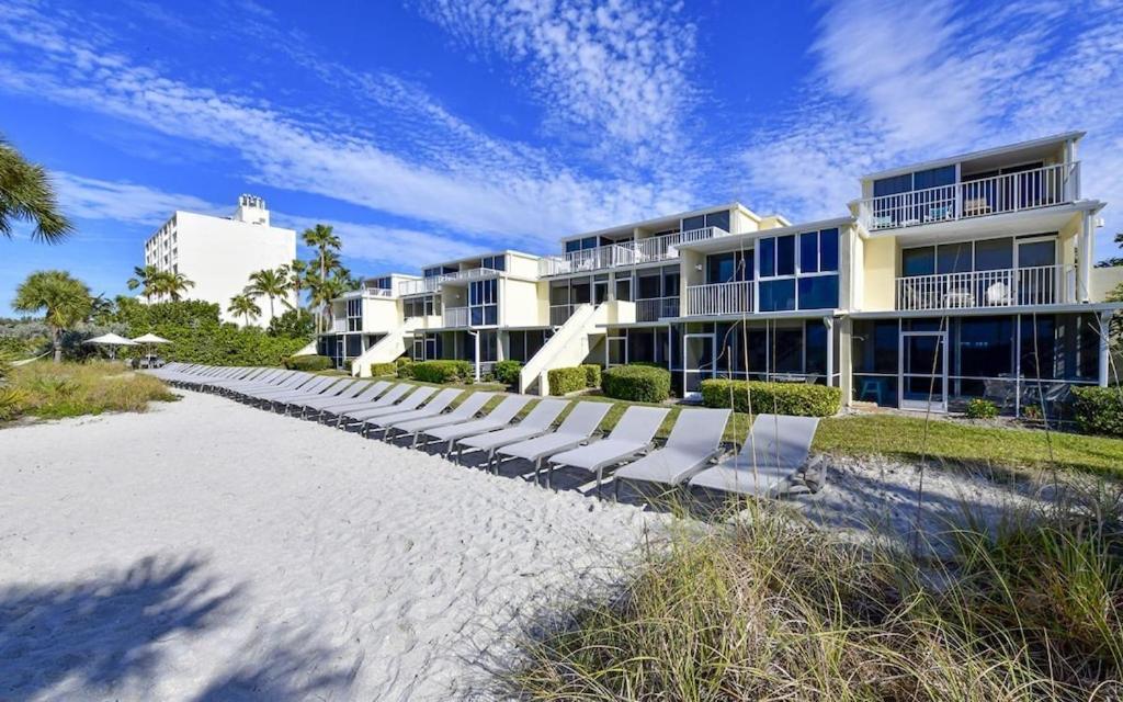 LaPlaya 201C Breathtaking Gulf panorama from this corner end unit with a private stairway to the beach photo 1