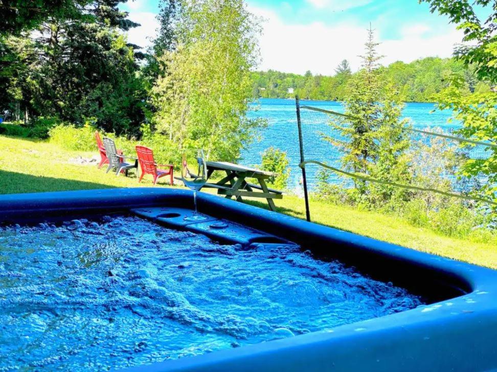 Chalet le Harfang- SPA-Bord Lac Beaulac by Galaxia photo 1