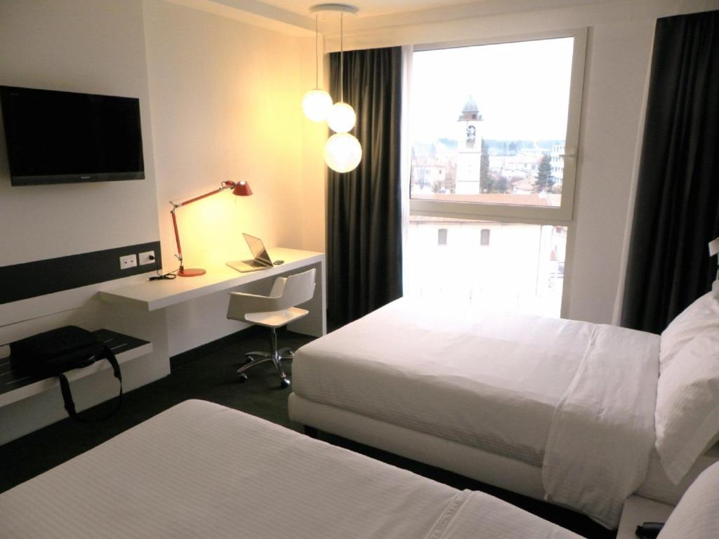Idea Hotel Milano Malpensa Airport - Tap to explore photos