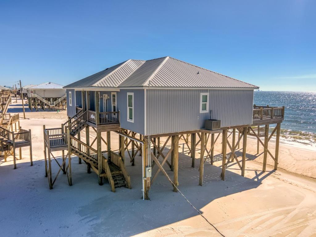 Awake On The Gulf - Gulf Front! Gaze Up At The Stars From Your Large Deck While Listening To The Waves Crash. 4 Bedroom Home by RedAwning image