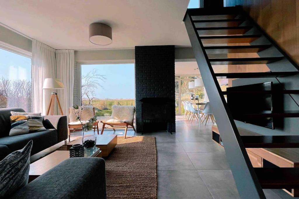 Luxe 8 persoons ‘Golfvillatexel’ vlakbij zee photo 3