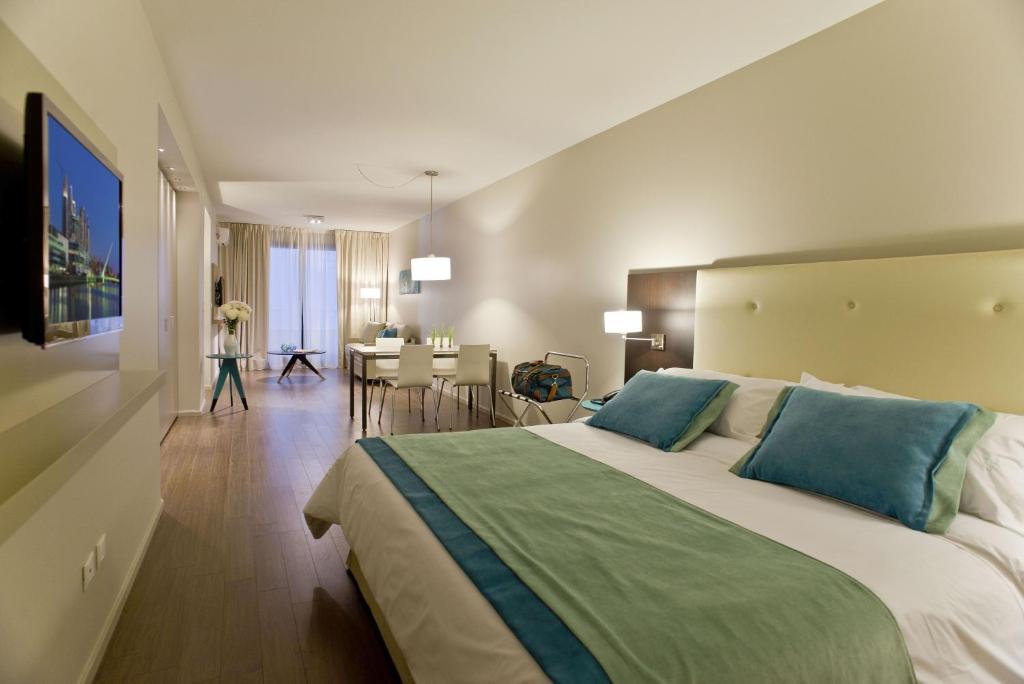 Bulnes Eco Suites - Tap to explore photos