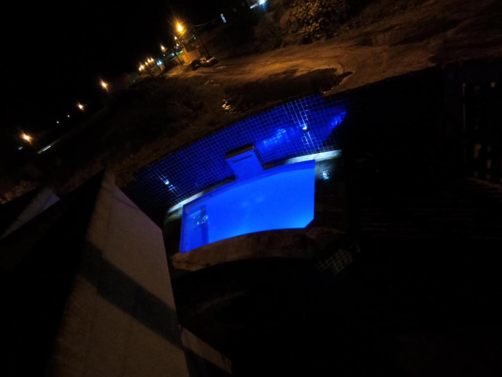 Casa com piscina , churrasqueira, Wi-Fi, em rua de Areia à 1km da praia, bairro sussegado, proíbido uso de som extremamente alto ideal para descansar photo 1