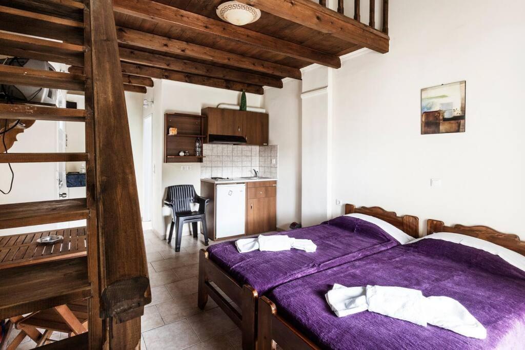 Despina Studios 4 beds with loft and kitchenette # 8 photo 1