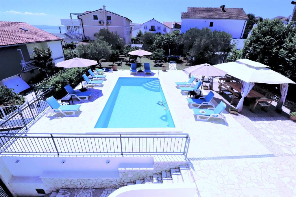 Villa Mendula Trogir - Luxury beachfront villa with large pool area surrounded by organic vegetable garden and olive trees photo 1