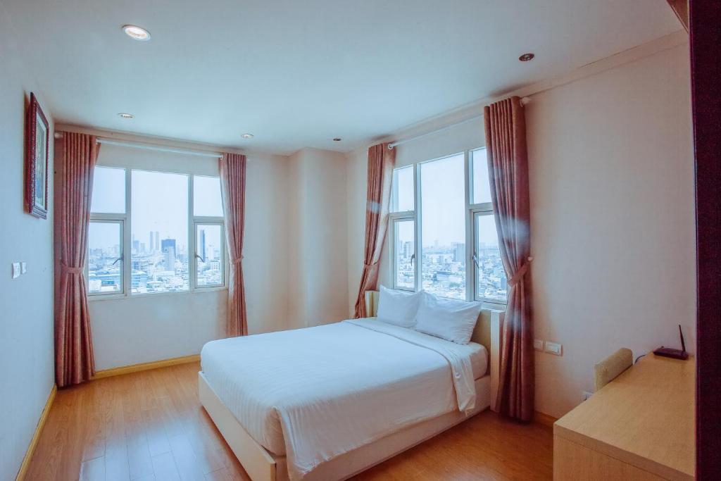 Khách Sạn Vĩnh Trung Plaza Apartments 
