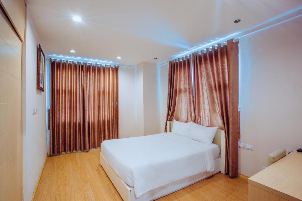 Khách Sạn Vĩnh Trung Plaza Apartments 