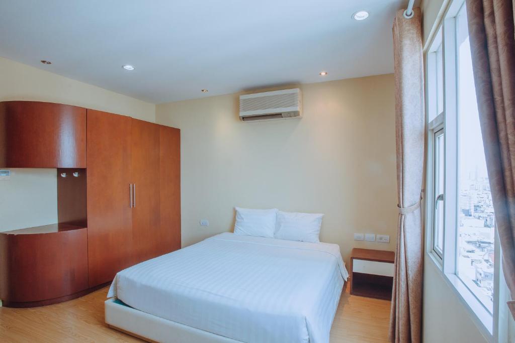 Khách Sạn Vĩnh Trung Plaza Apartments 