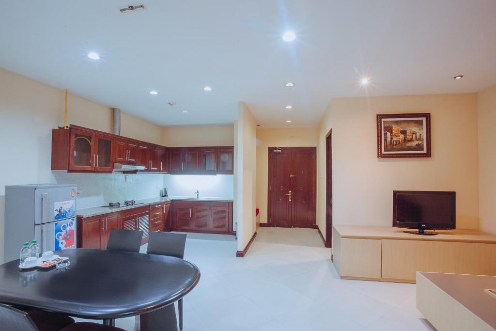 Khách Sạn Vĩnh Trung Plaza Apartments 