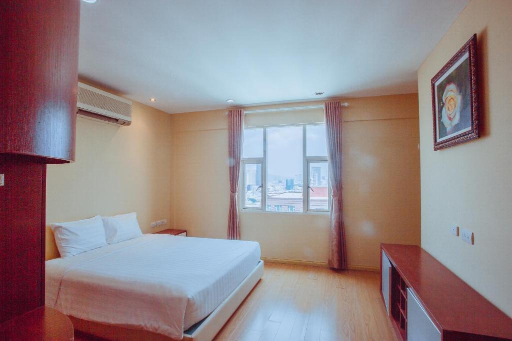 Khách Sạn Vĩnh Trung Plaza Apartments 