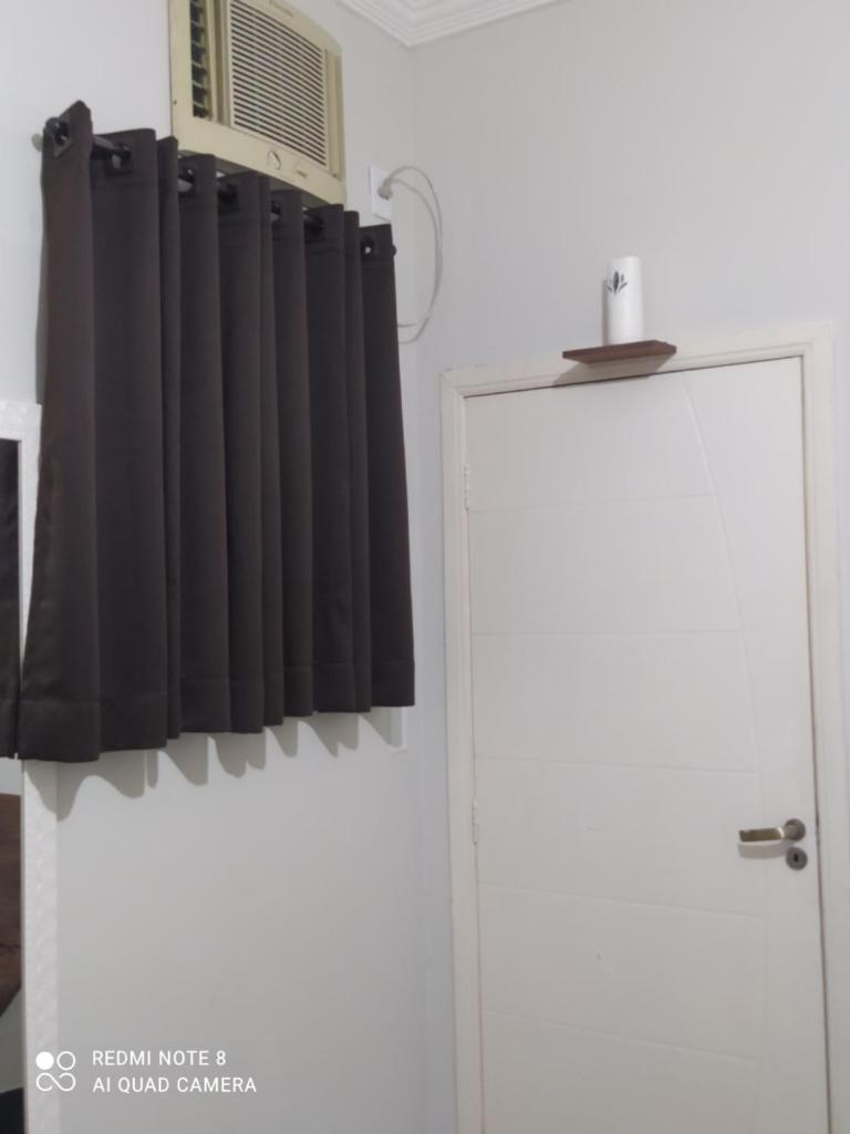 Quarto com ventilador,ar frigobar e garagem photo 4