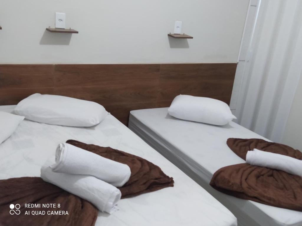 Quarto com ventilador,ar frigobar e garagem photo 2