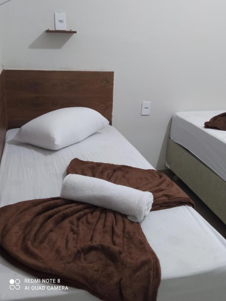 Quarto com ventilador,ar frigobar e garagem photo 3