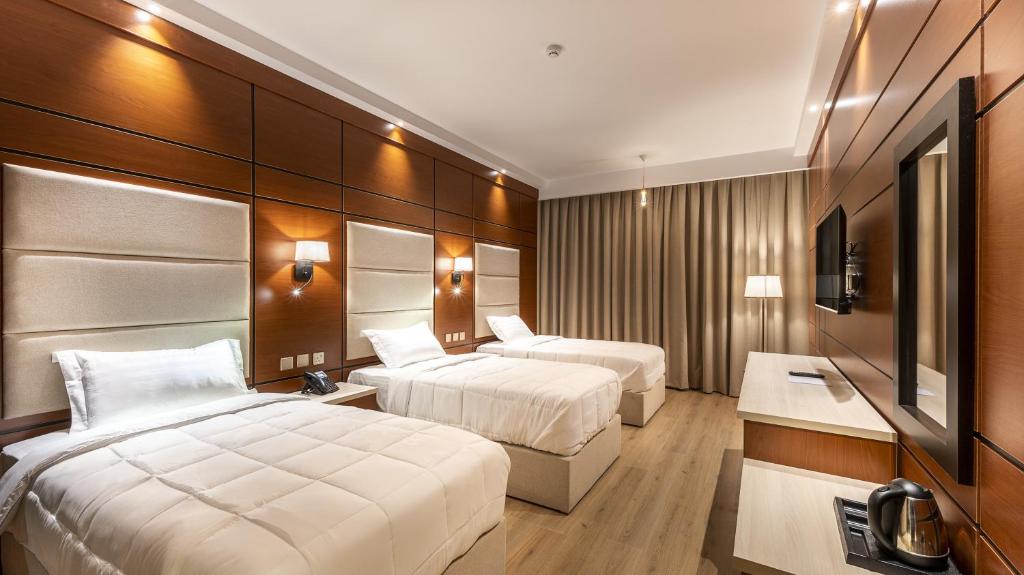 FLAVOR HOTEL CO. Room Type - Triple Deluxe Room