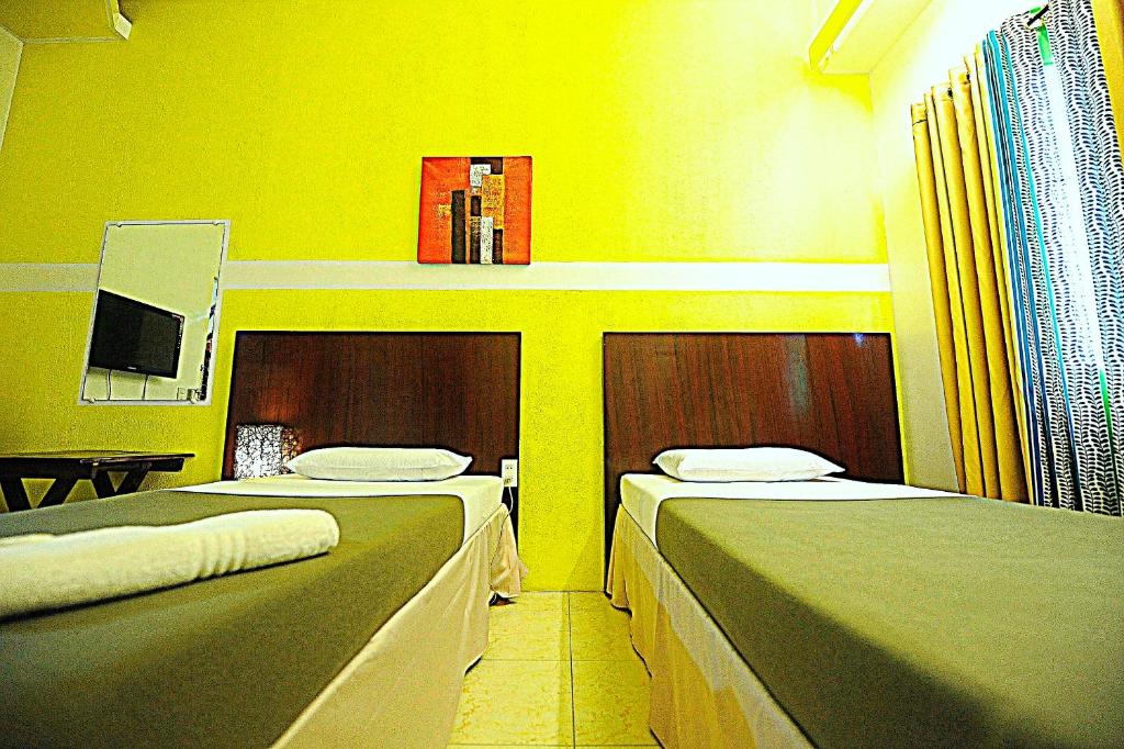 Двухместный (Двухместный номер с 2 отдельными кроватями), First Pacific Inn Davao