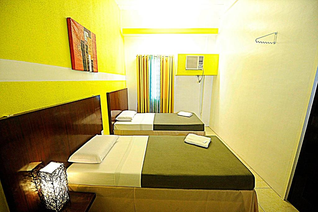 Двухместный (Двухместный номер с 2 отдельными кроватями), First Pacific Inn Davao