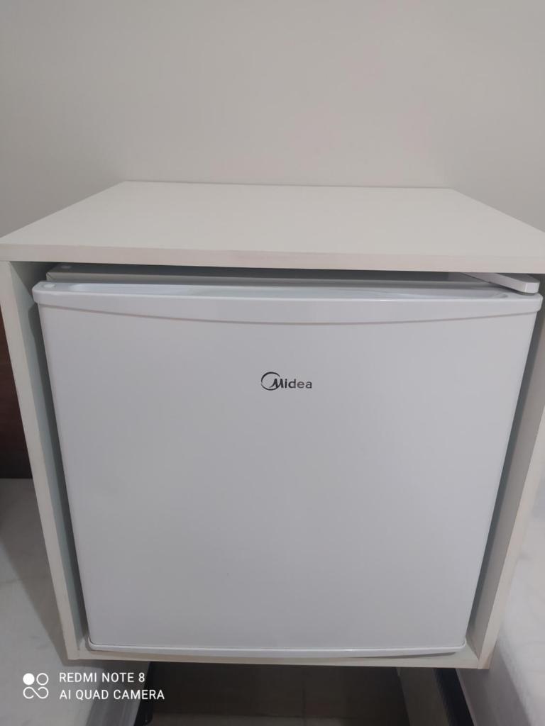 Quarto com ventilador,ar frigobar e garagem photo 1