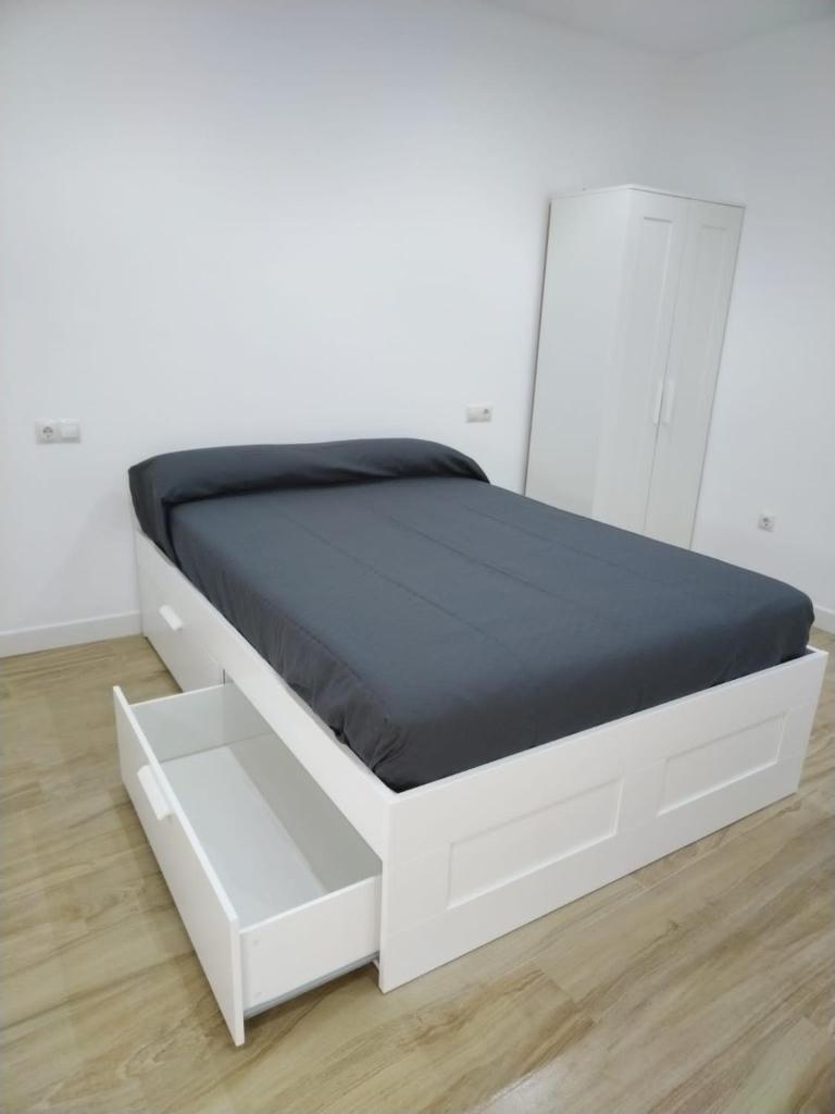 CASTRO Suites Osuna - Tap to explore photos