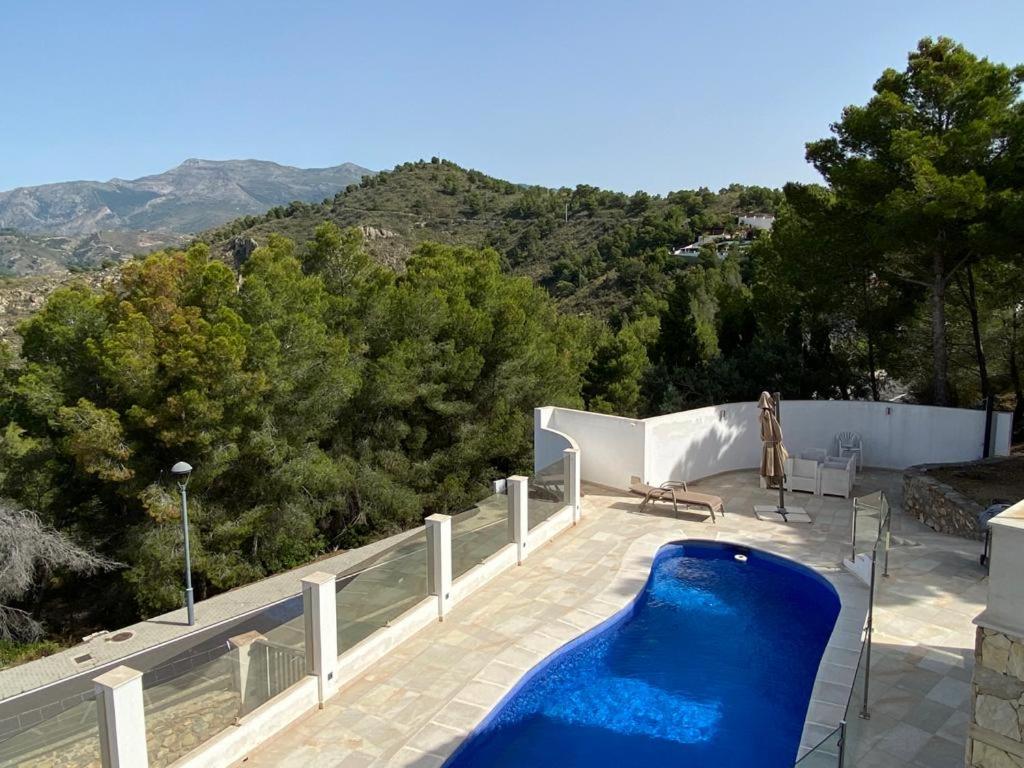 Half of the luxury villa with sea view and pool in natural park photo 1