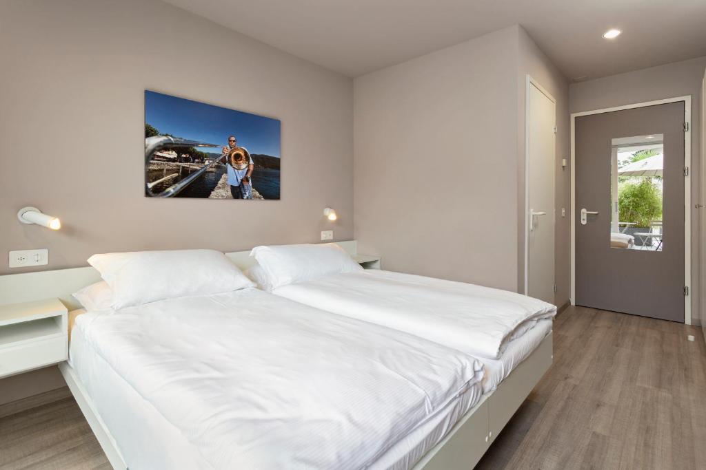 Jazz Hotel Ascona - Tap to explore photos