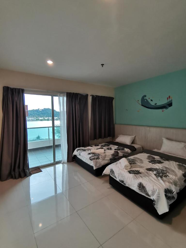 Rustic one bedroom unit for 4 pax with Sea View by JoMy Homestay photo 1