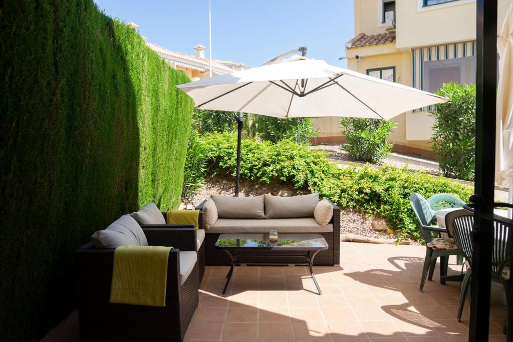 Beautiful Townhouse with views over the communal pool close to Campoamor Golf Course photo 1