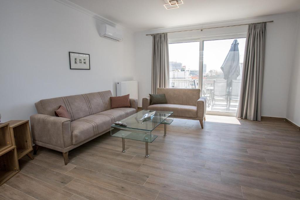 Raise Kifisias Serviced Apartments - Tap to explore photos