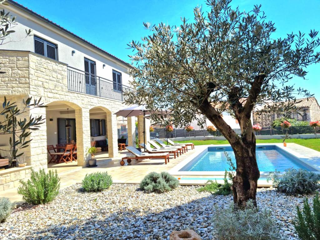Villa Ajda with heated privat pool, jacuzzi, sauna, 4 bedroom, 4 bathroom photo 1