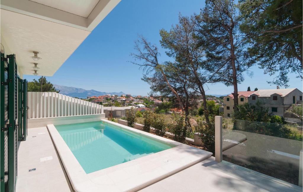 Nice Home In Sumartin With Outdoor Swimming Pool, Wifi And 3 Bedrooms