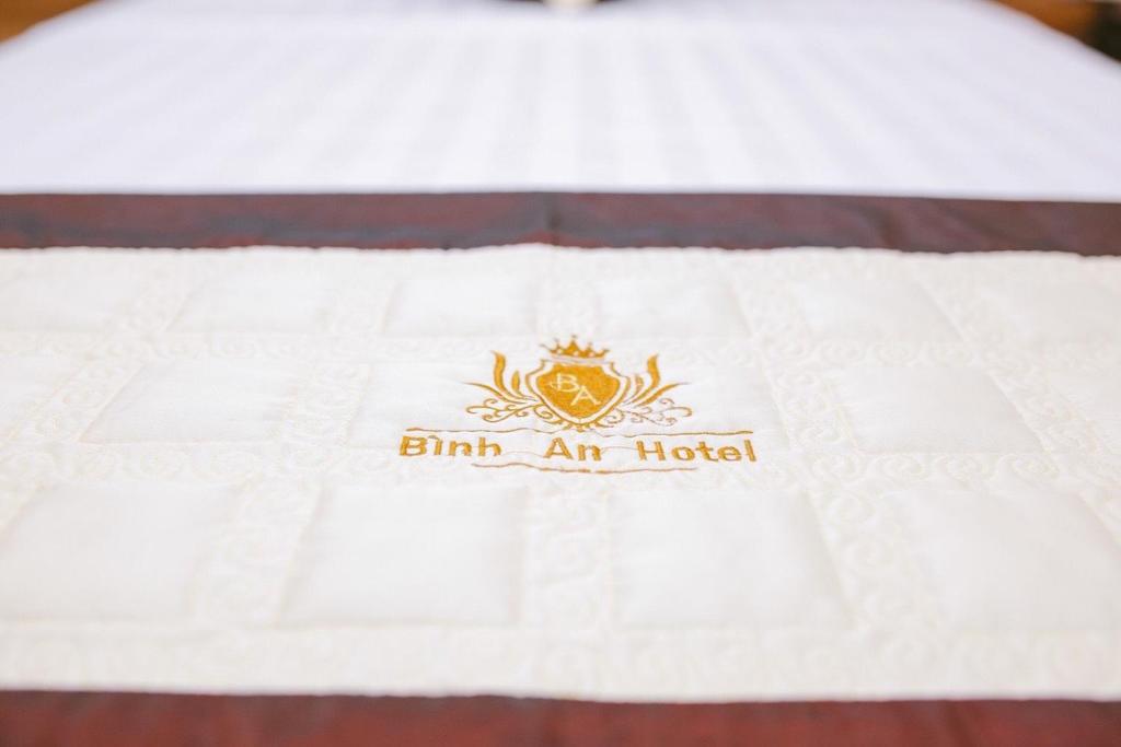 BINH AN hotel - Tap to explore photos