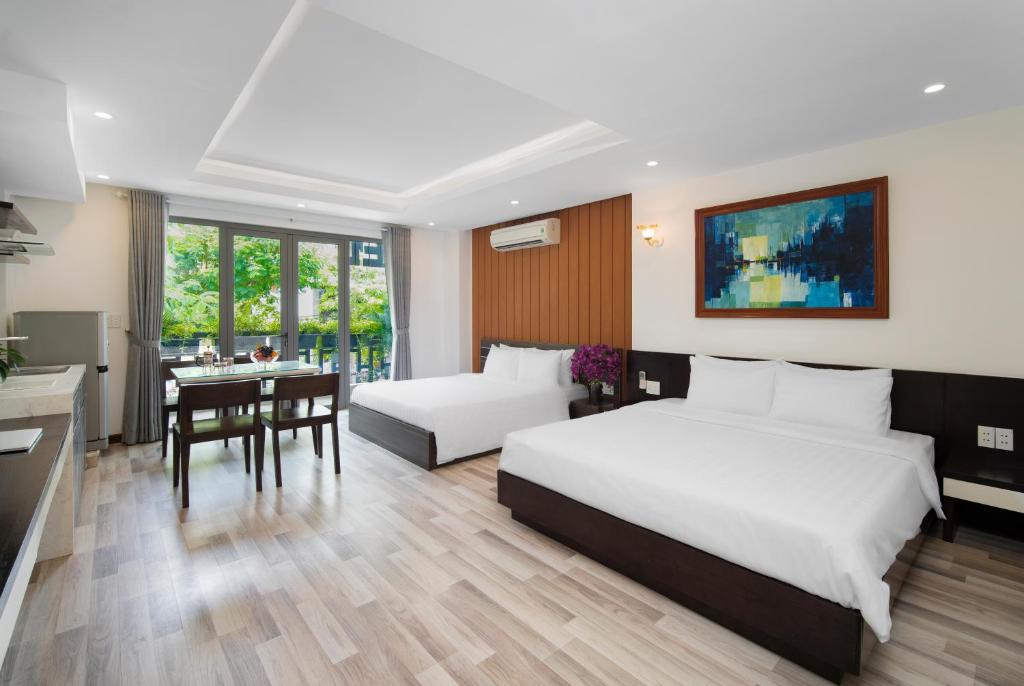 AOA Danang Beach Hotel - Tap to explore photos