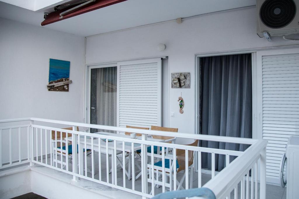 Grey Theros Apartments photo 1