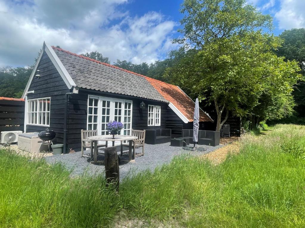 Natuurhuisje - Gastenverblijf De Kleine Hazerij